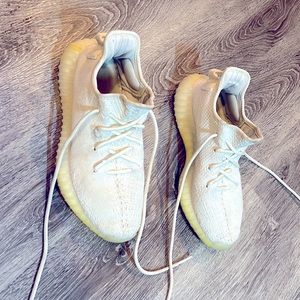 Used white Yeezy‘s